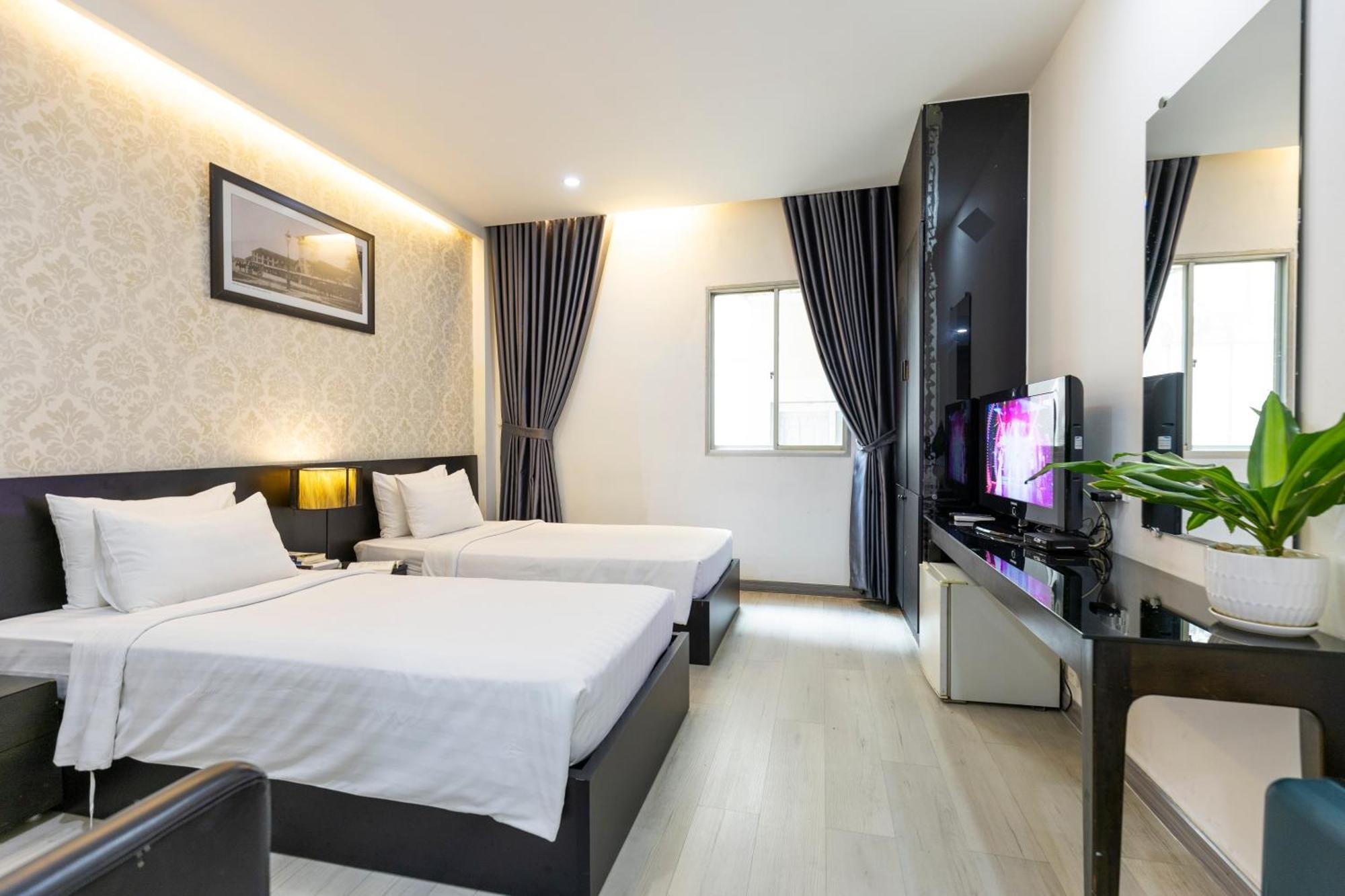The One Premium Hotel Thành Pho Ho Chí Minh Esterno foto